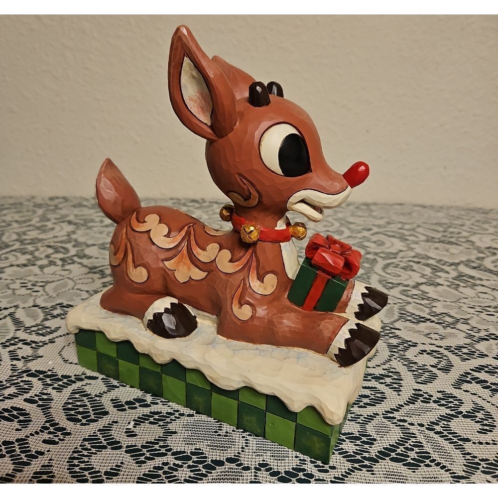 Rudolph the Red-Nosed Reindeer with Present Figurine By Jim Shore